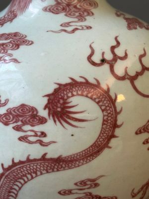 A Chinese blue, white and copper-red 'dragon' tianqiu ping' vase, 18th C. — photo 8