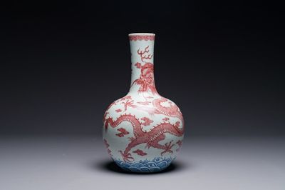 A Chinese blue, white and copper-red 'dragon' tianqiu ping' vase, 18th C.