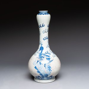 A Chinese blue, white and copper-red garlic-mouth vase with mythical animals, Kangxi mark, 19th C. — photo 1