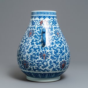 A Chinese blue, white and copper red 'hu' vase, Qianlong mark, 19/20th C. — photo 4