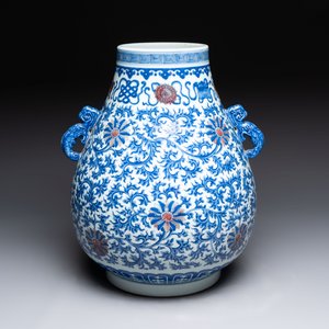 A Chinese blue, white and copper-red 'hu' vase with lotus scrolls, Qianlong mark, 19th C. — photo 3
