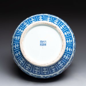 A Chinese blue, white and copper-red 'hu' vase with lotus scrolls, Qianlong mark, 19th C. — photo 6