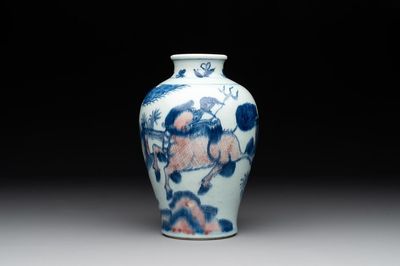 A Chinese blue, white and copper-red 'kylin and phoenix' vase, 19th C.