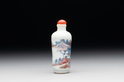 A Chinese blue, white and copper-red 'landscape' snuff bottle, 19th C.