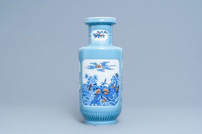 A Chinese blue, white and copper red lavender blue-ground rouleau vase, 19/20th C.