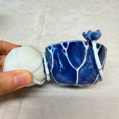 A Chinese blue, white and copper-red lotus-form water dropper — photo 4
