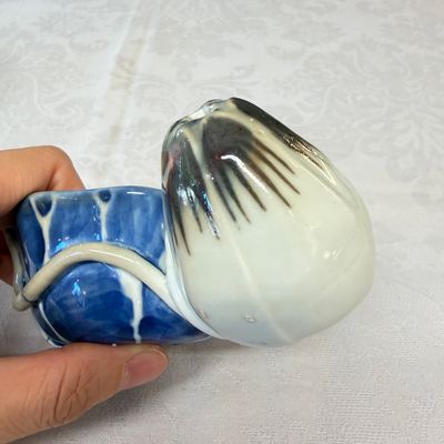 A Chinese blue, white and copper-red lotus-form water dropper — photo 5