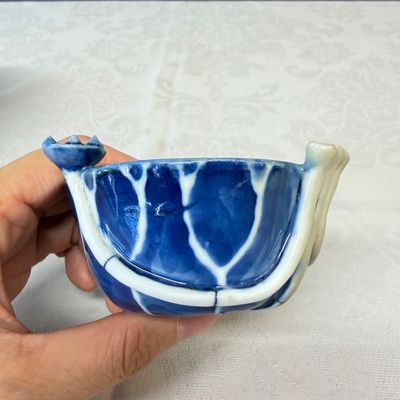 A Chinese blue, white and copper-red lotus-form water dropper — photo 7