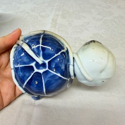 A Chinese blue, white and copper-red lotus-form water dropper — photo 10