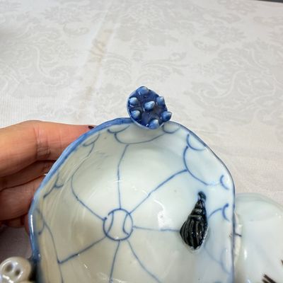 A Chinese blue, white and copper-red lotus-form water dropper — photo 11