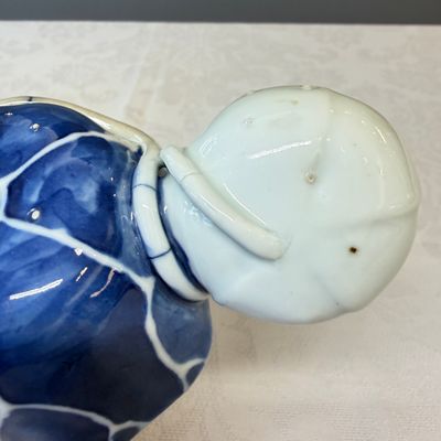 A Chinese blue, white and copper-red lotus-form water dropper — photo 12