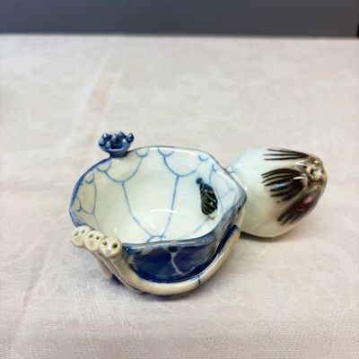 A Chinese blue, white and copper-red lotus-form water dropper — photo 1
