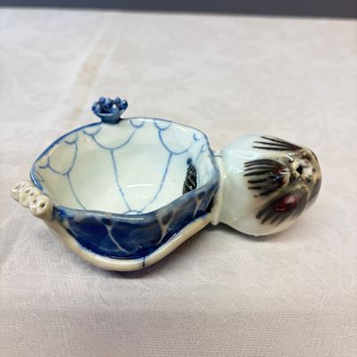 A Chinese blue, white and copper-red lotus-form water dropper — photo 2