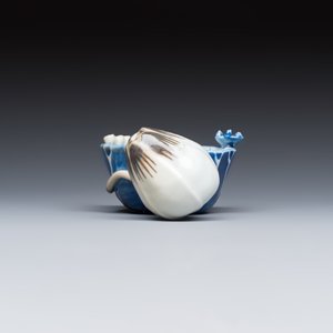 A Chinese blue, white and copper-red lotus-form water dropper — photo 3