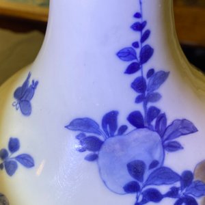 A Chinese blue, white and copper-red 'peaches' bottle vase with inscription, Kangxi — photo 20