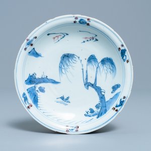 A Chinese blue, white and copper red plate, Ming — photo 1