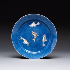 A Chinese blue, white and copper-red powder-blue-ground 'fish' dish, Kangxi — photo 1