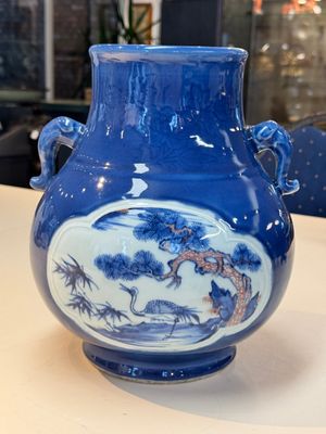 A Chinese blue, white and copper-red powder-blue-ground 'hu' vase, Qianlong — photo 3
