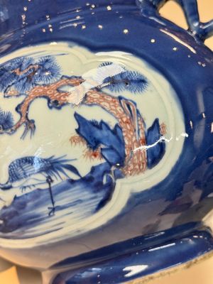 A Chinese blue, white and copper-red powder-blue-ground 'hu' vase, Qianlong — photo 6