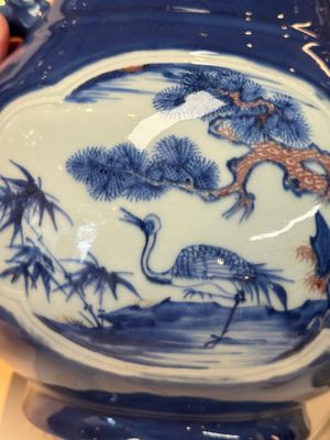 A Chinese blue, white and copper-red powder-blue-ground 'hu' vase, Qianlong — photo 7