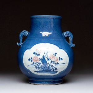 A Chinese blue, white and copper-red powder-blue-ground 'hu' vase, Qianlong — photo 1