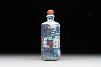 A Chinese blue, white and copper-red snuff bottle, Kangxi mark, 19th C.