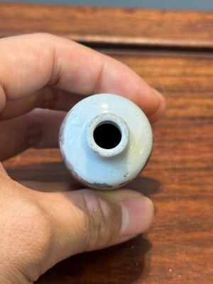 A Chinese blue, white and copper-red snuff bottle with inscription, 19th C. — photo 6