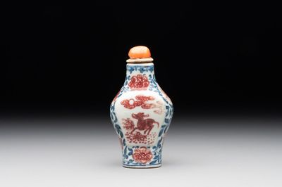 A Chinese blue, white and copper-red snuff 'deer' bottle, Yongzheng mark and of the period