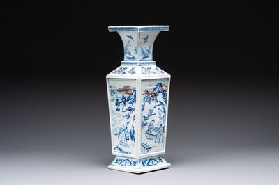 A Chinese blue, white and copper-red square-sectioned vase with figural design, Kangxi