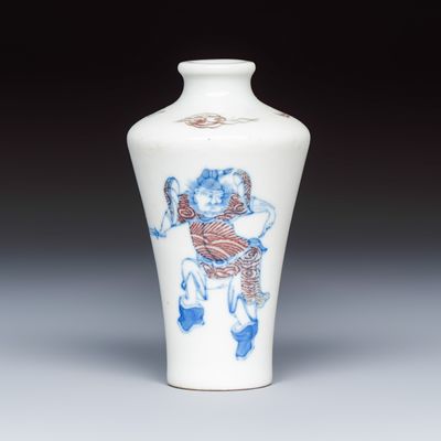 A Chinese blue, white and copper-red 'Zhong Kui' snuff bottle, Guangxu mark and of the period
