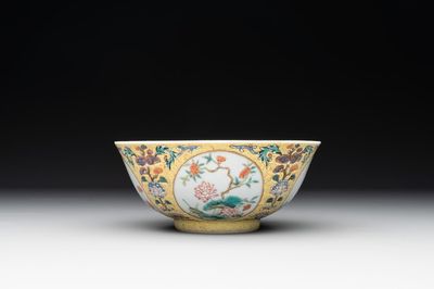 A Chinese blue, white and famille rose bowl with floral design, Qianlong mark, 19/20th C.