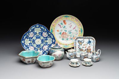 A Chinese blue, white and famille rose tea service, three famille rose bowls, a plate and a covered jar, 19th C.