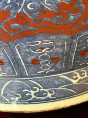 A Chinese blue, white and iron-red 'bajixiang' 'hu' vase on wooden stand, Qianlong mark, 19th C. — photo 12
