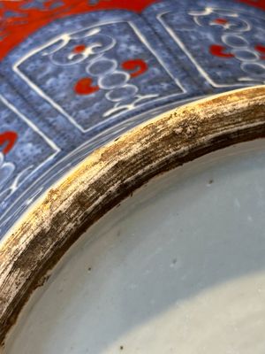 A Chinese blue, white and iron-red 'bajixiang' 'hu' vase on wooden stand, Qianlong mark, 19th C. — photo 18