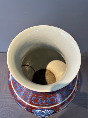A Chinese blue, white and iron-red 'bajixiang' 'hu' vase on wooden stand, Qianlong mark, 19th C. — photo 5