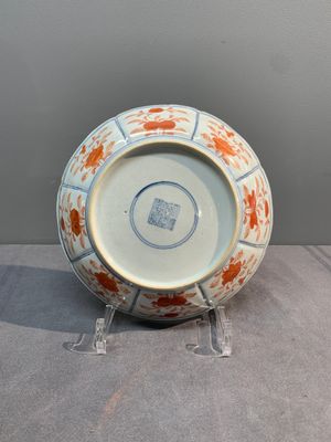 A Chinese blue, white and iron-red 'Buddhist lion' plate, Qianlong mark and of the period — photo 2