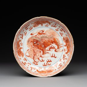 A Chinese blue, white and iron-red 'Buddhist lion' plate, Qianlong mark and of the period — photo 1