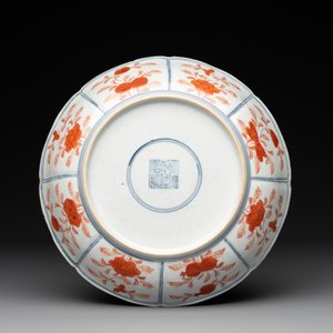 A Chinese blue, white and iron-red 'Buddhist lion' plate, Qianlong mark and of the period — photo 2
