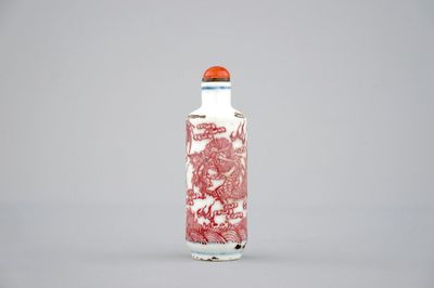 A Chinese blue, white and iron red dragon snuff bottle, ca. 1900