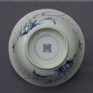 A Chinese blue, white and red on celadon ground 'prunus' bowl, Kangxi — photo 17