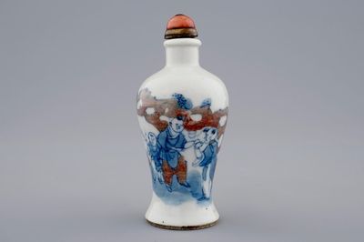 A Chinese blue, white and underglaze red snuff bottle, 19th C.