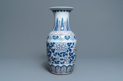A Chinese blue, white and underglaze red vase, 19th C.