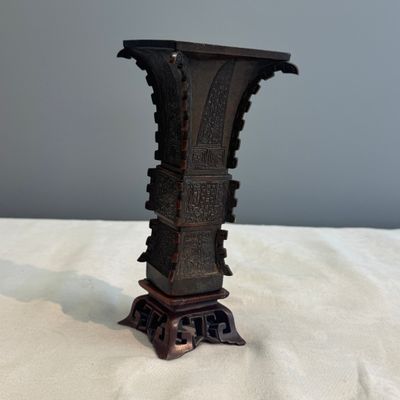 A Chinese bronze archaistic fang zun on a later wooden stand — photo 2