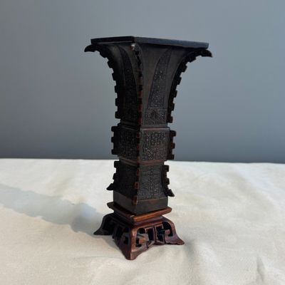 A Chinese bronze archaistic fang zun on a later wooden stand — photo 3