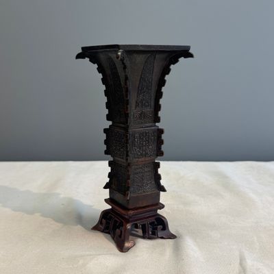 A Chinese bronze archaistic fang zun on a later wooden stand — photo 4