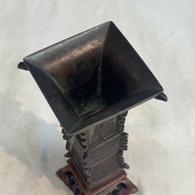 A Chinese bronze archaistic fang zun on a later wooden stand — photo 5
