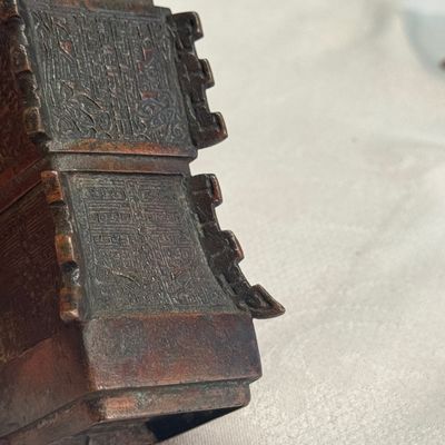A Chinese bronze archaistic fang zun on a later wooden stand — photo 10