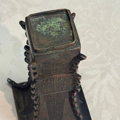 A Chinese bronze archaistic fang zun on a later wooden stand — photo 12