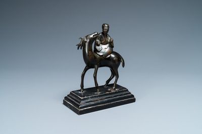 A Chinese bronze censer depicting a scholar on a deer, early Qing