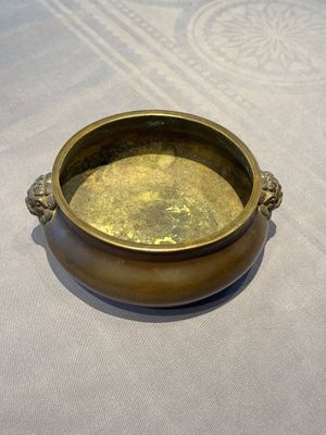 A Chinese bronze censer with lion-form handles, 大明宣德五年監造工部官監吳邦佐造 mark, 18th C. — photo 1